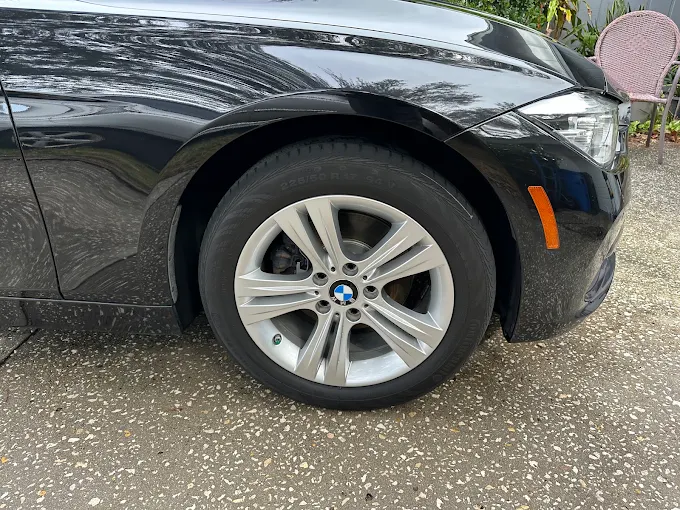 Clean BMW wheel and dressed tire