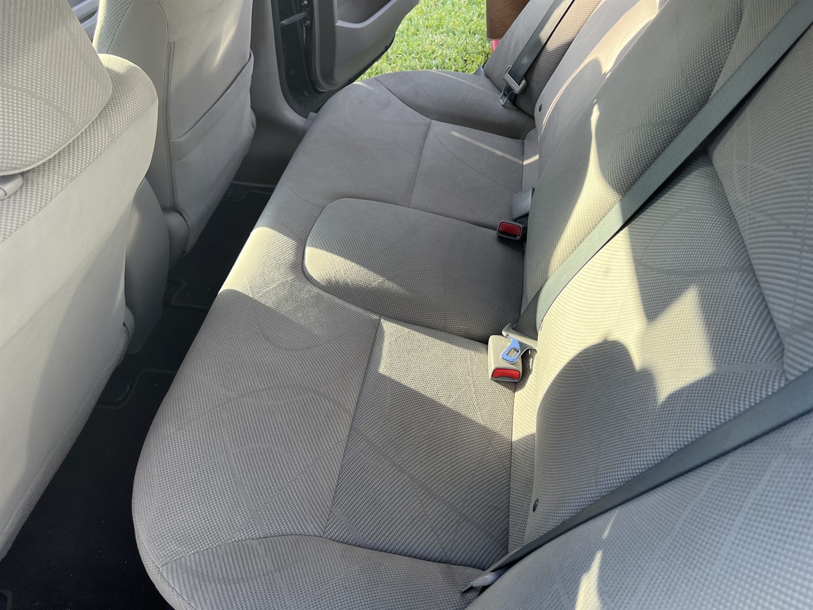 Clean cloth rear seat in a Honda Civic after an interior detail